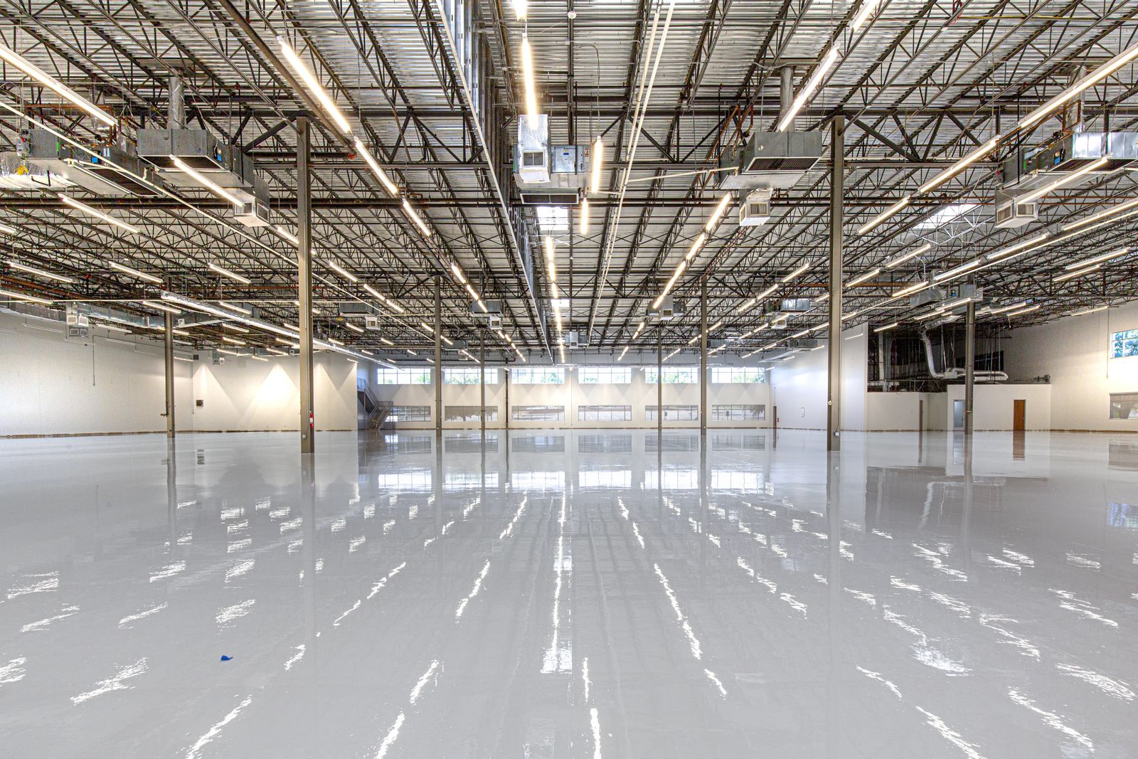 Finished, high-gloss garage floor coated by Armor Shine Floors