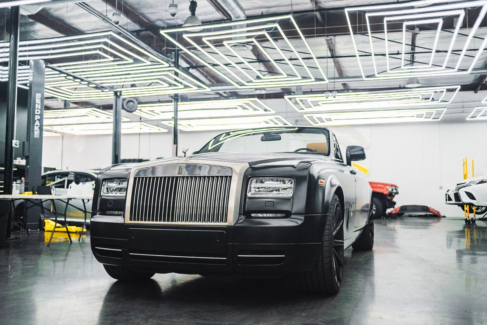 A Twin Falls garage lit evenly with bright, daylight-color LED shop fixtures across the ceiling